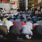 A large group of muslims praying