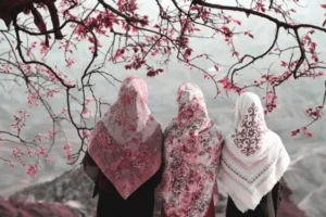 three muslim women viewed from behind
