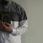 A man holding a quran