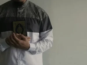 A man holding a quran