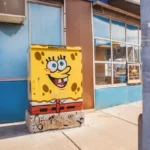 A street art image of spongebob squarepants on a cabinet