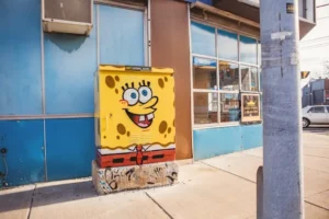 A street art image of spongebob squarepants on a cabinet