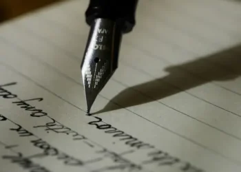 A fountain pen writing an argue essay