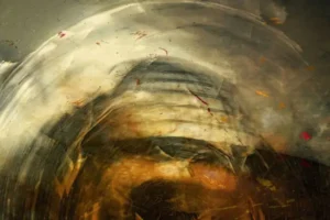 An abstract image in forboding yellows somewhat resembling a peruvian or incan temple