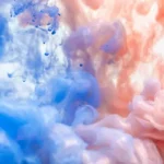 Abstract pink and blue clouds of smoke
