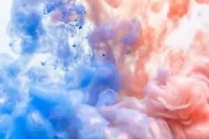 Abstract pink and blue clouds of smoke