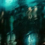 An abstract shot resembling a reflection in a puddle at night