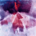 An abstract image of triangles in blues, purples, and reds.
