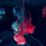 An abstract liquid form of blues and reds