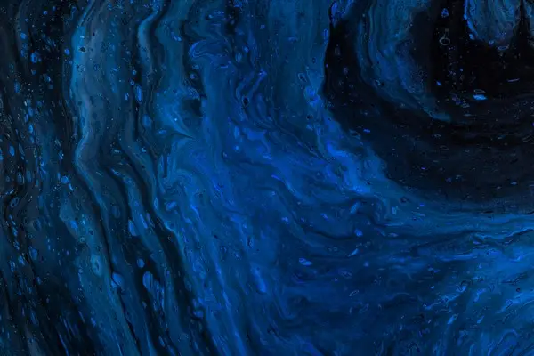 An abstract blue image resembling the microscopic view of a human hair