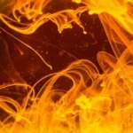 An abstract artwork in deep oranges resembling lava