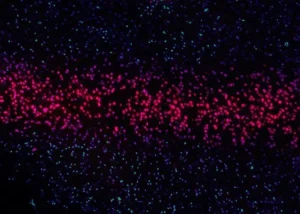 An abstract image of pink objects in space