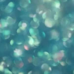 An abstract image of light refractions in various hues of blue