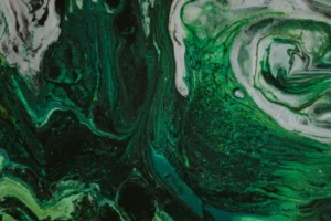 Abstract swirls of green liquid