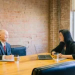 Two business people experiencing work