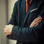 A man in a corporate suit