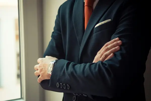 A man in a corporate suit
