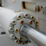 A white hydraulic piston