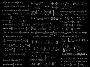 A large formula or collection of formulas written in chalk on a blackboard