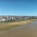 An aerial shot of high rise beachfront properties