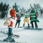 Santa and the elves snowboarding