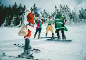 Santa and the elves snowboarding