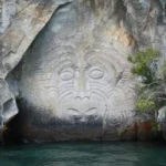 A maori design on a rock